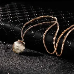 Gold Clam Shell Locket -Citrusreef Store clam sea shell locket necklace in gold 3